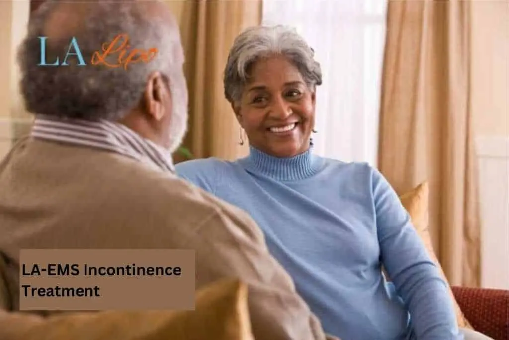 Couple sat smiling at each other - LA-EMS treatment Kew