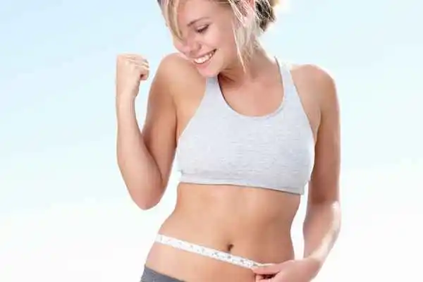 woman happy after fat reduction treatment Kew
