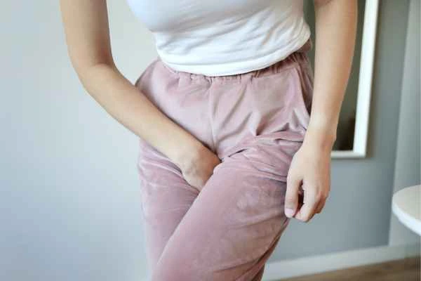 older woman running to the toilet because of urinary incontinence Kew